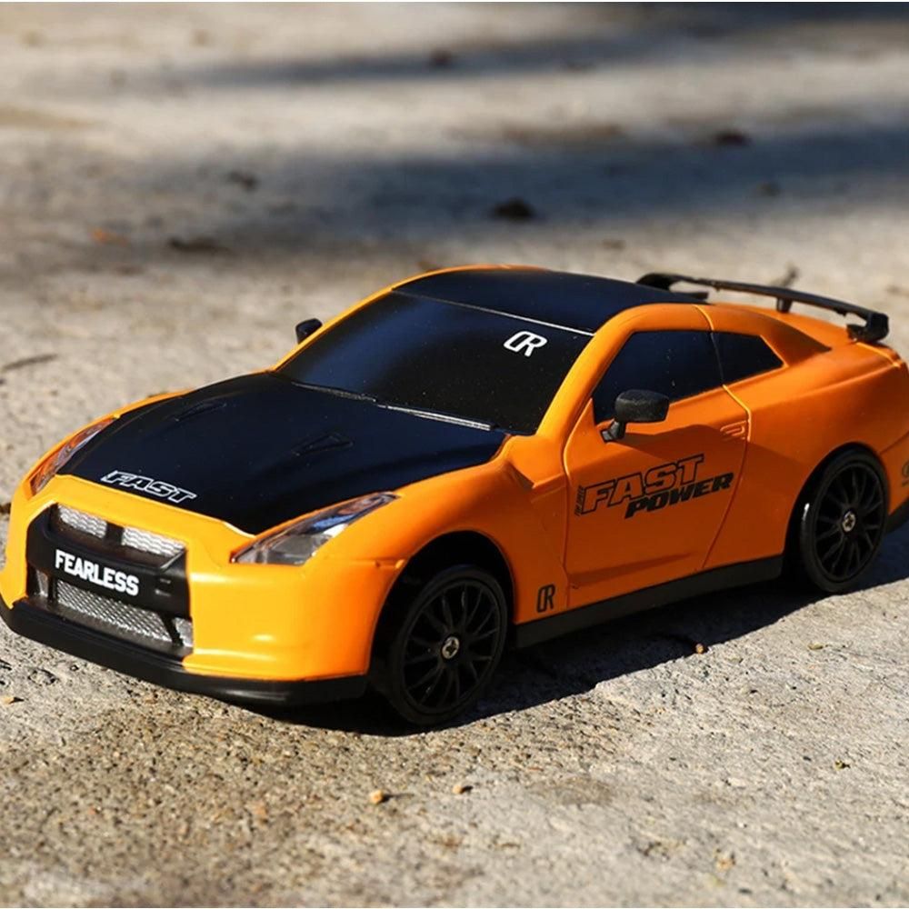1/24 2.4GHz RC Drift Car 4WD High Speed Remote Control Racing Vehicle Orange for 3 year old+ - Image 4