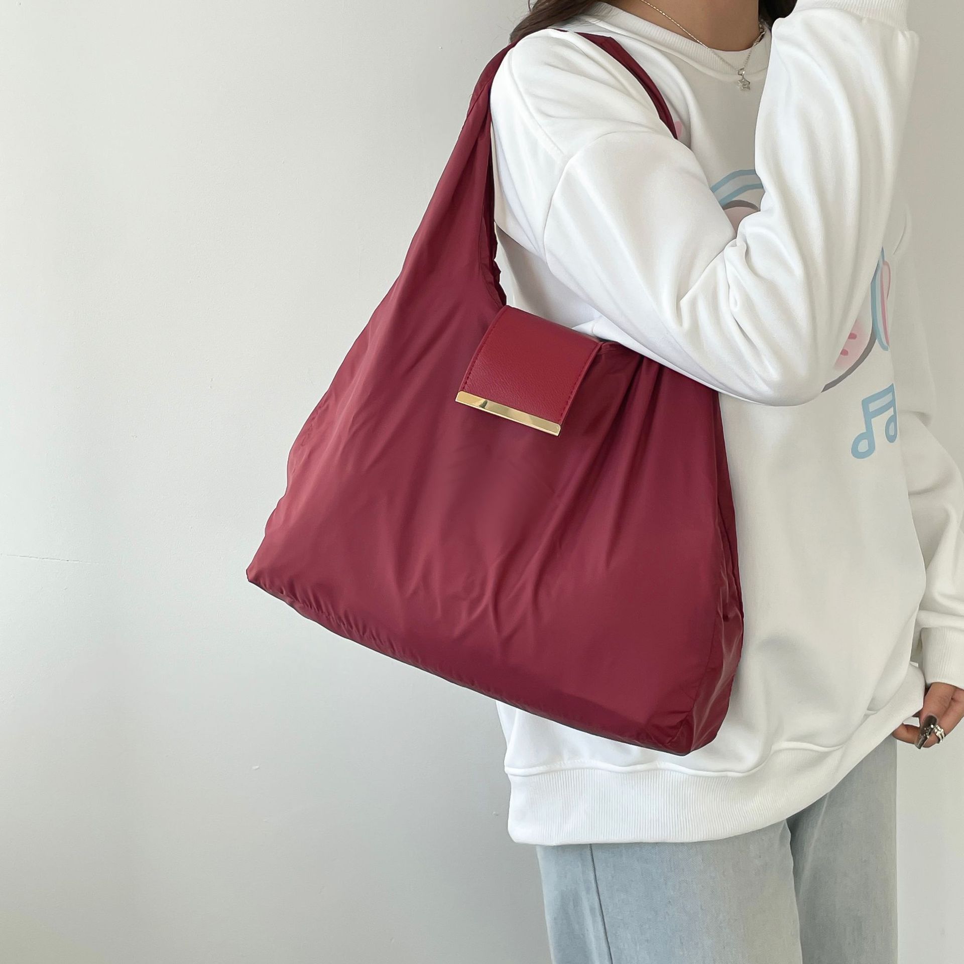 khaki Foldable Tote Bag with Built-In Storage Pouch – Compact Reusable Shopping Bag That Packs into Itself, Ideal for Daily Carry and Eco-Friendly Use - Image 2